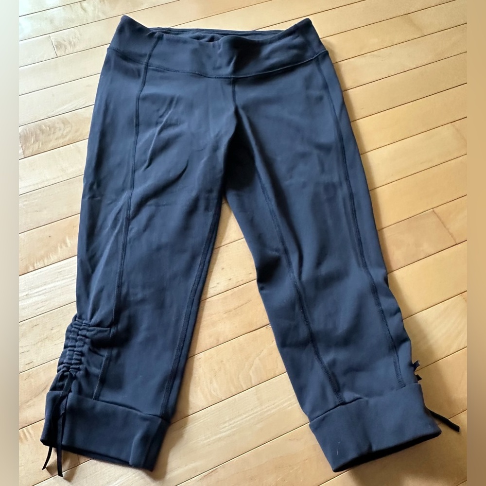 REI women's black leggings with ruched side-size small